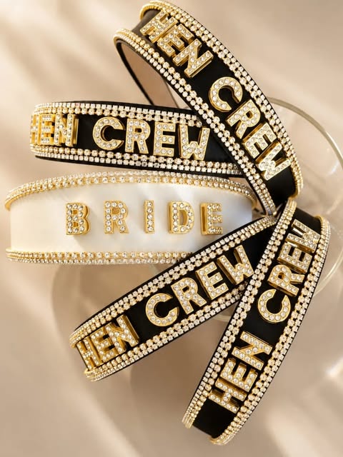 Bride and Hen Crew crystal crowns arranged together