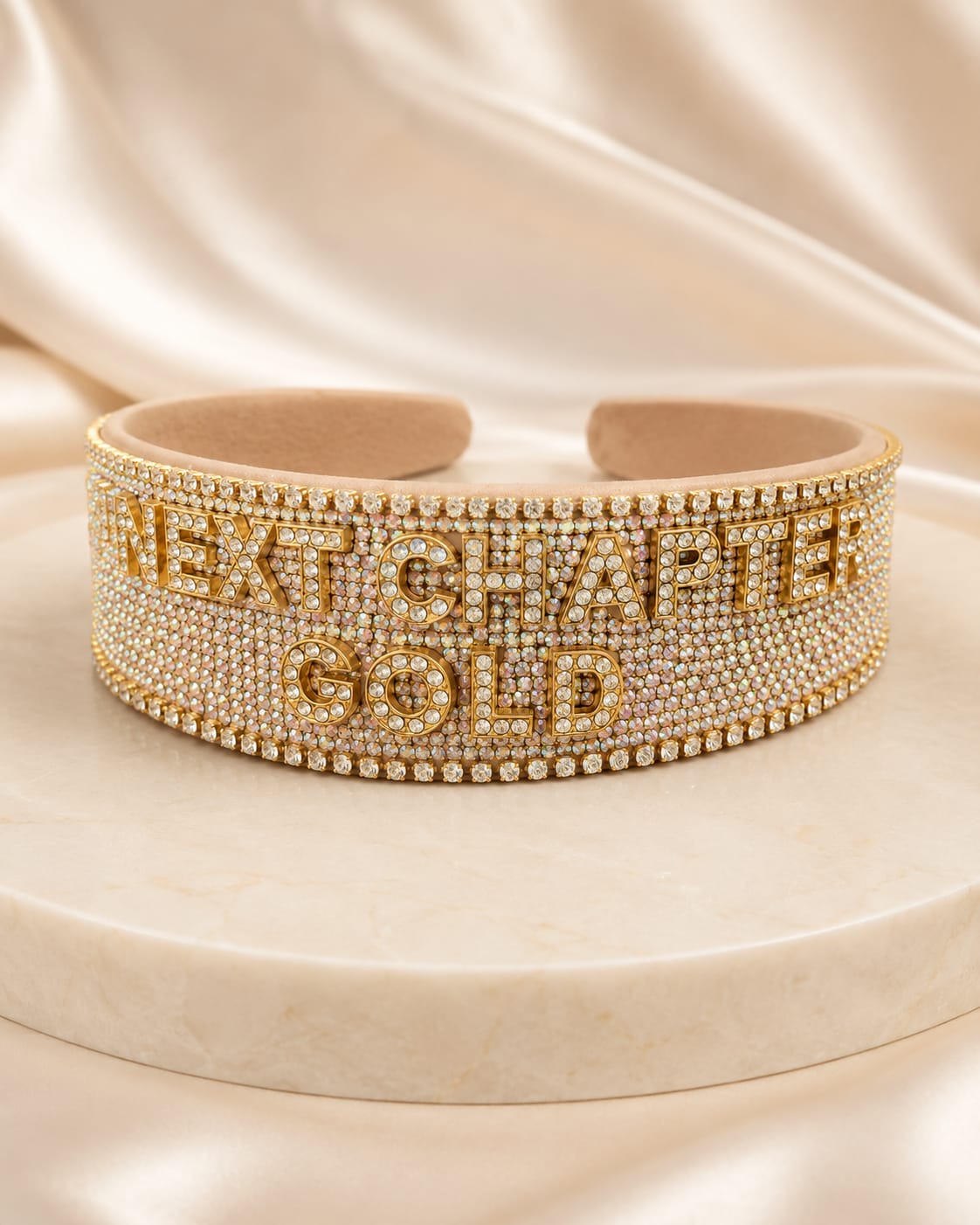 Next Chapter Gold headband covered with champagne crystals